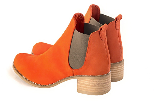 Clementine orange women's ankle boots, with elastics. Round toe. Low leather soles. Rear view - Florence KOOIJMAN
